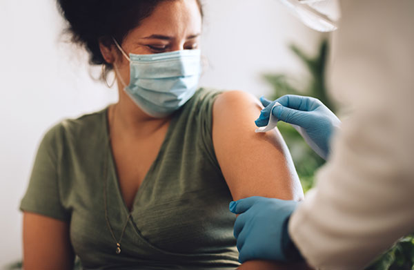 Woman receiving Covid vaccine 